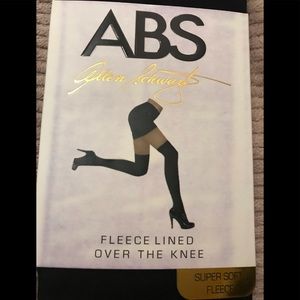 NWT Above knee fleece lined black socks.